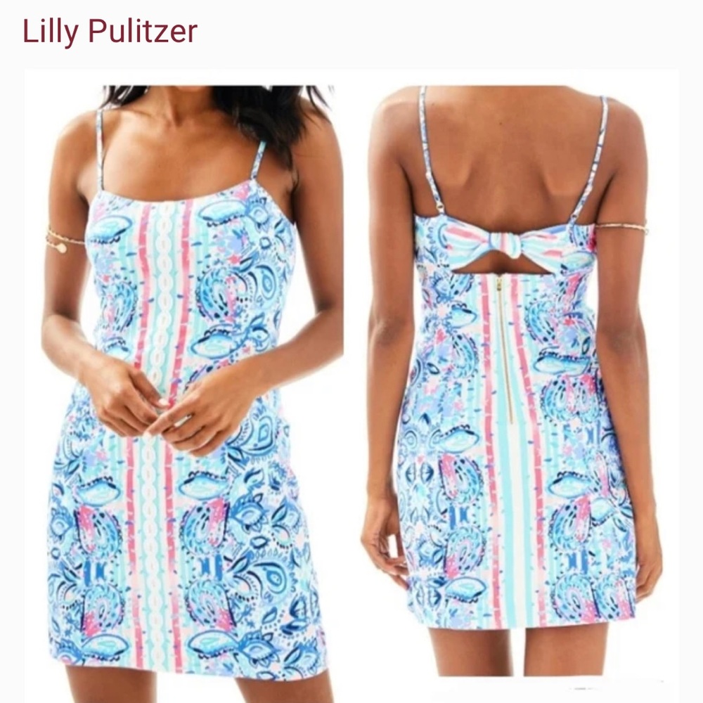 Perfect LP dress. Cute back tie. Bought for vacation but did not wear.